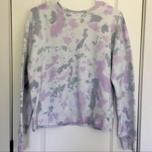 Light colored tie dye sweater.